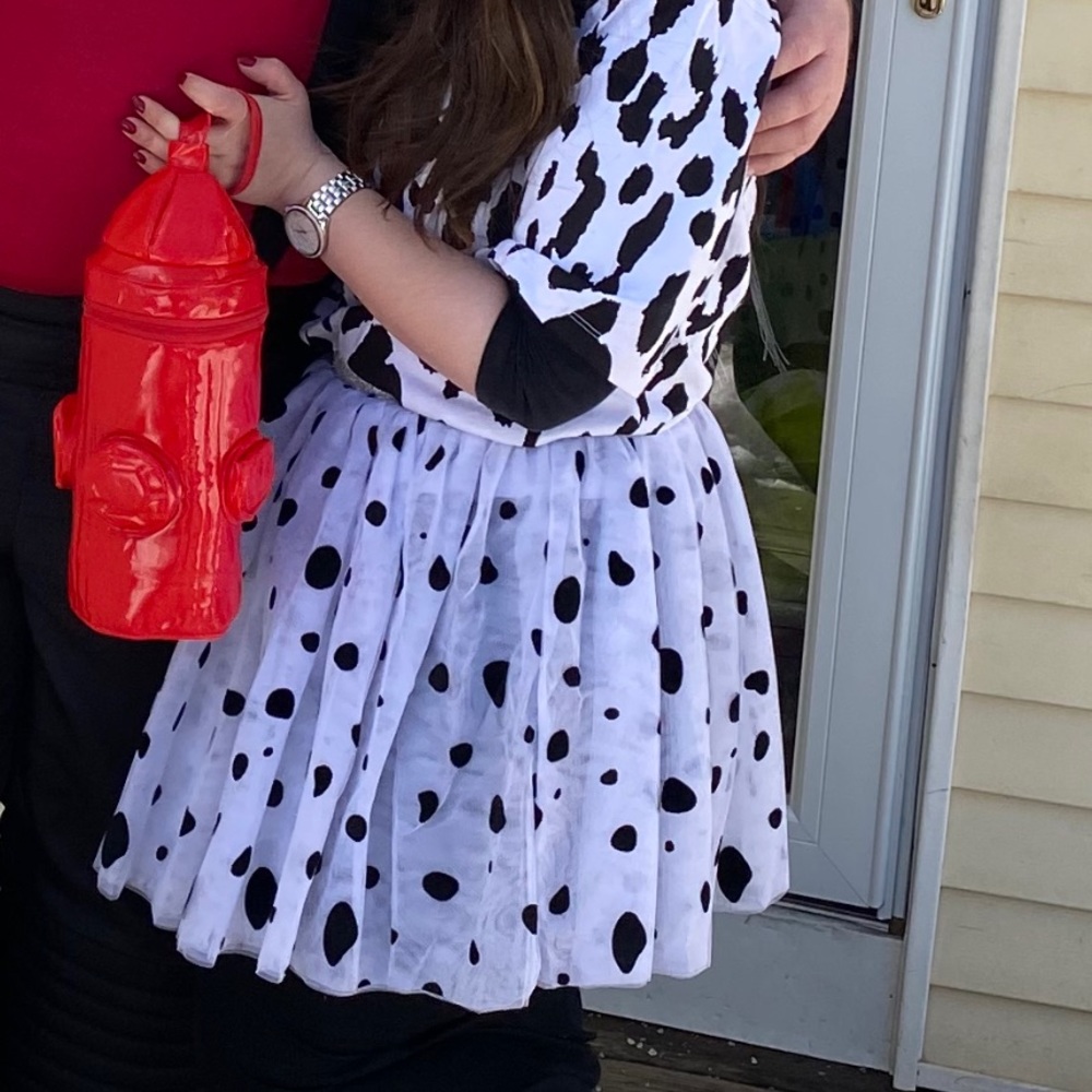 Woman’s Dalmatian costume with fire extinguisher purse